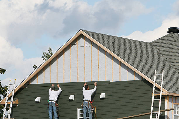 Professional Siding Contractor technician working in Helmetta, NJ